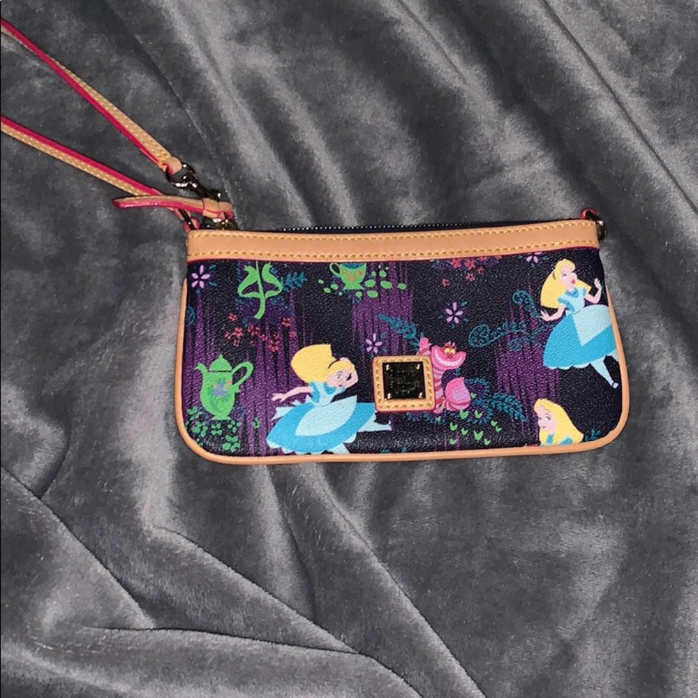 Alice in wonderland dooney and burke wristlet